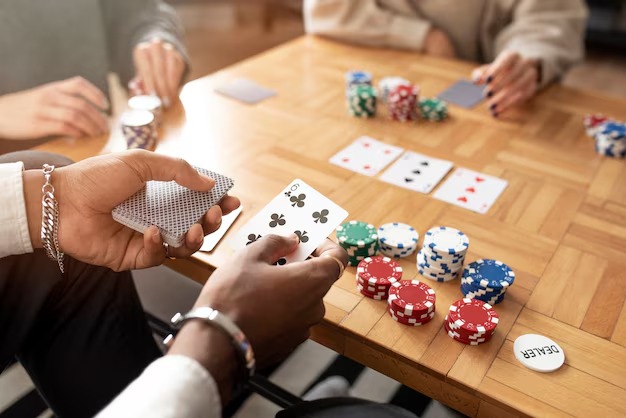 Caribbean Stud Poker table layout on jurusqq showing dealer position, player seats, and hand strength indicators